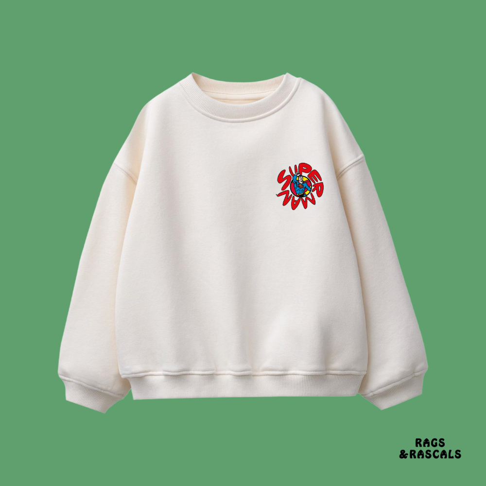 Superman white sweatshirt with a colorful logo, featuring the brand 'Rags & Rascals'.