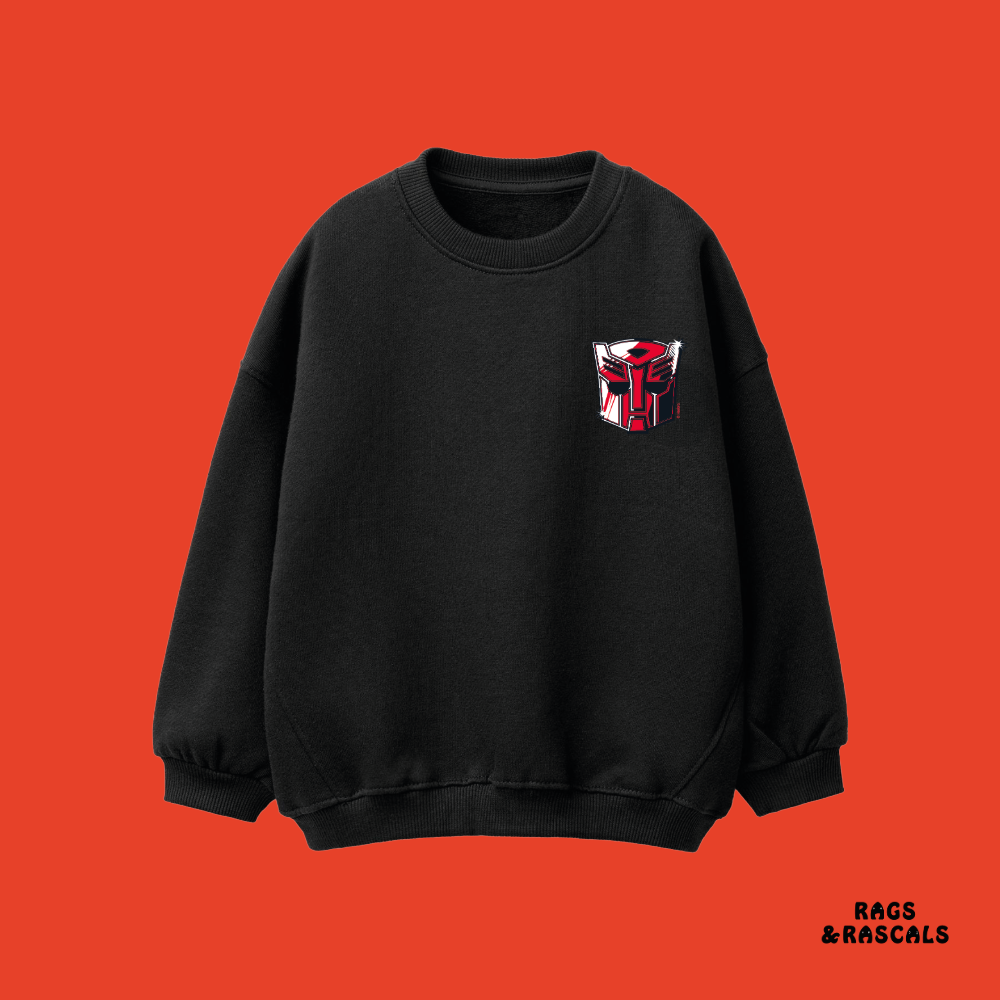 Black Transformers sweatshirt with a red and white logo,  from a children's brand called 'Rags & Rascals'.