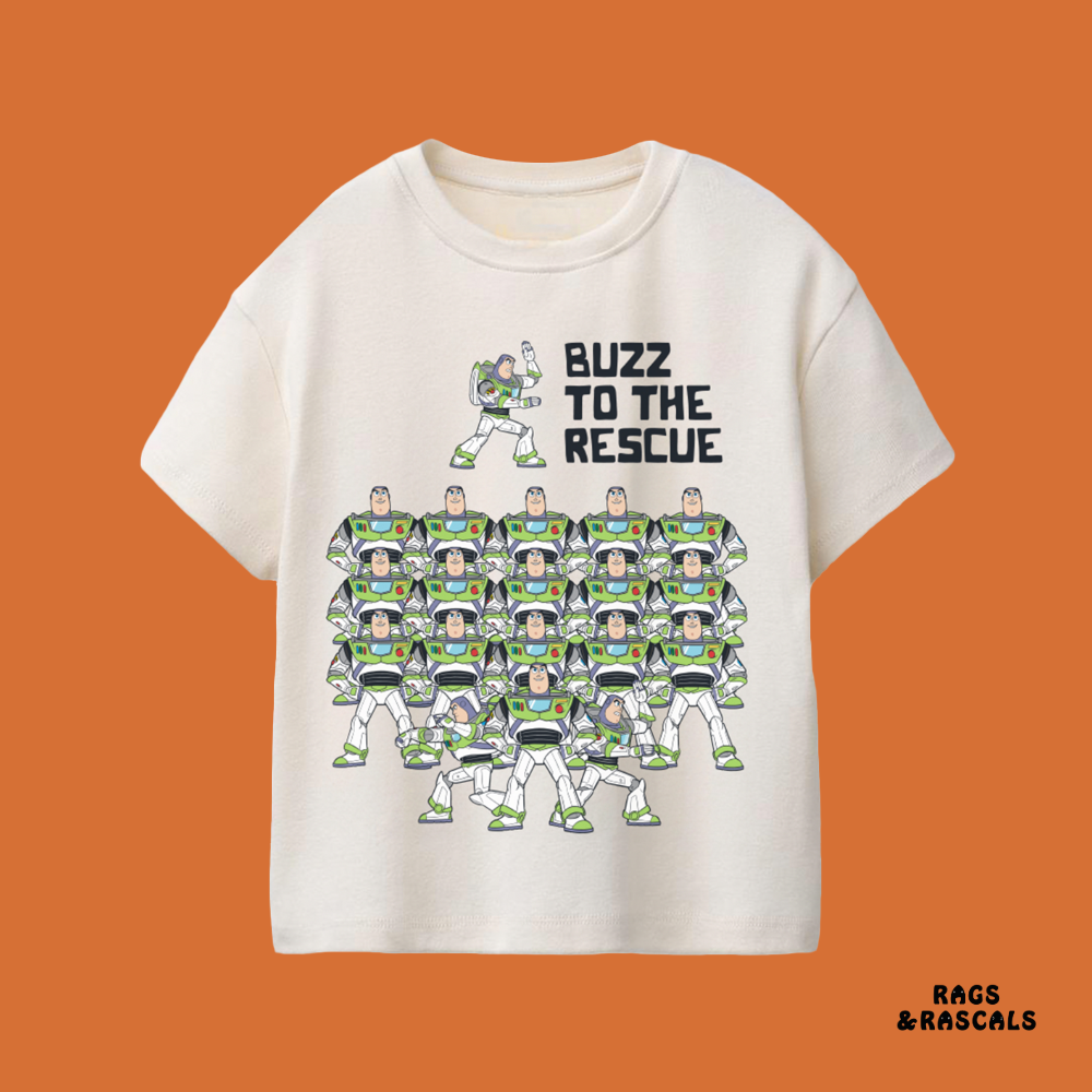 White t-shirt with Buzz Lightyear graphic and 'Buzz to the Rescue' text, from a children's brand called 'Rags & Rascals'.