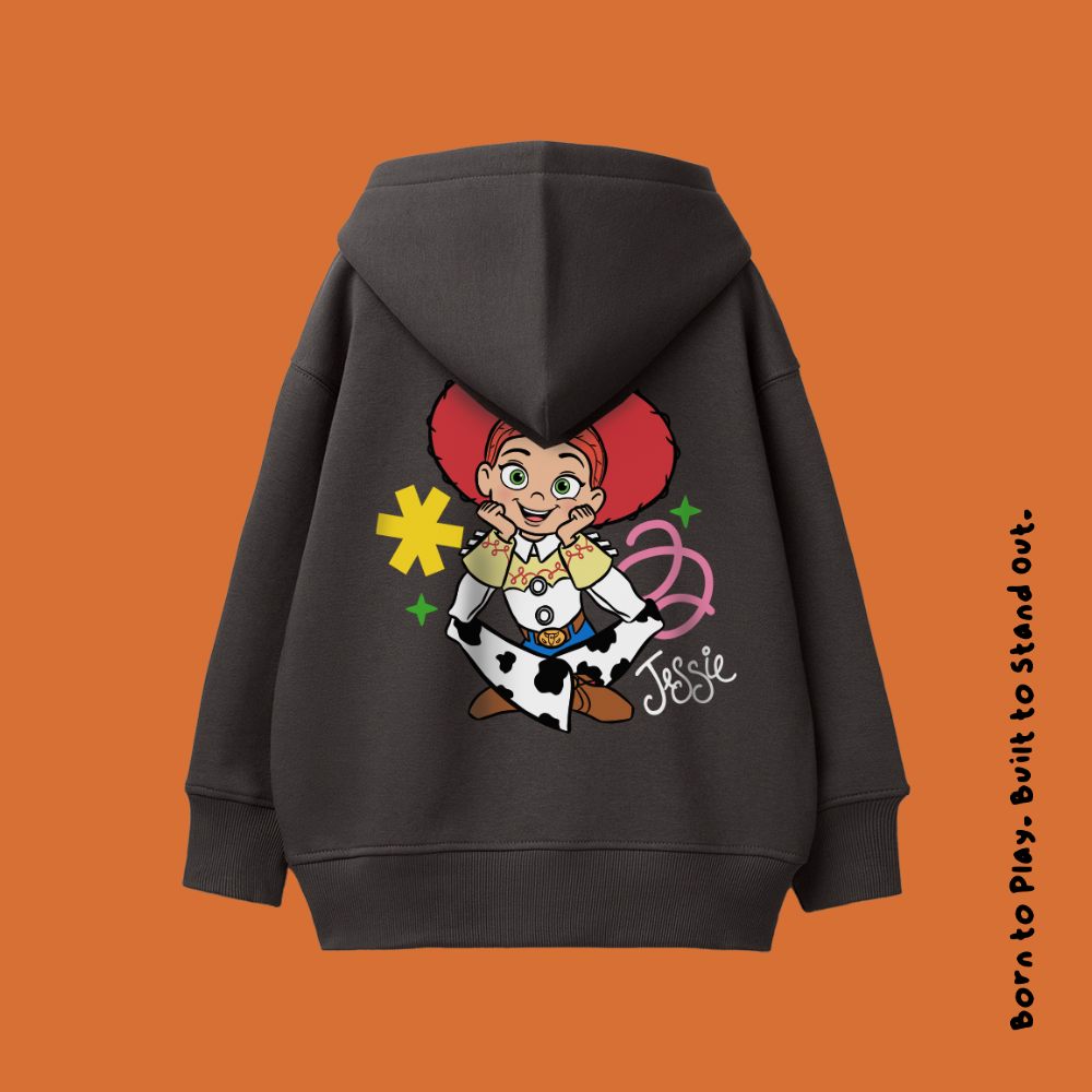 Black hoodie with a cartoon character on the back against an orange background