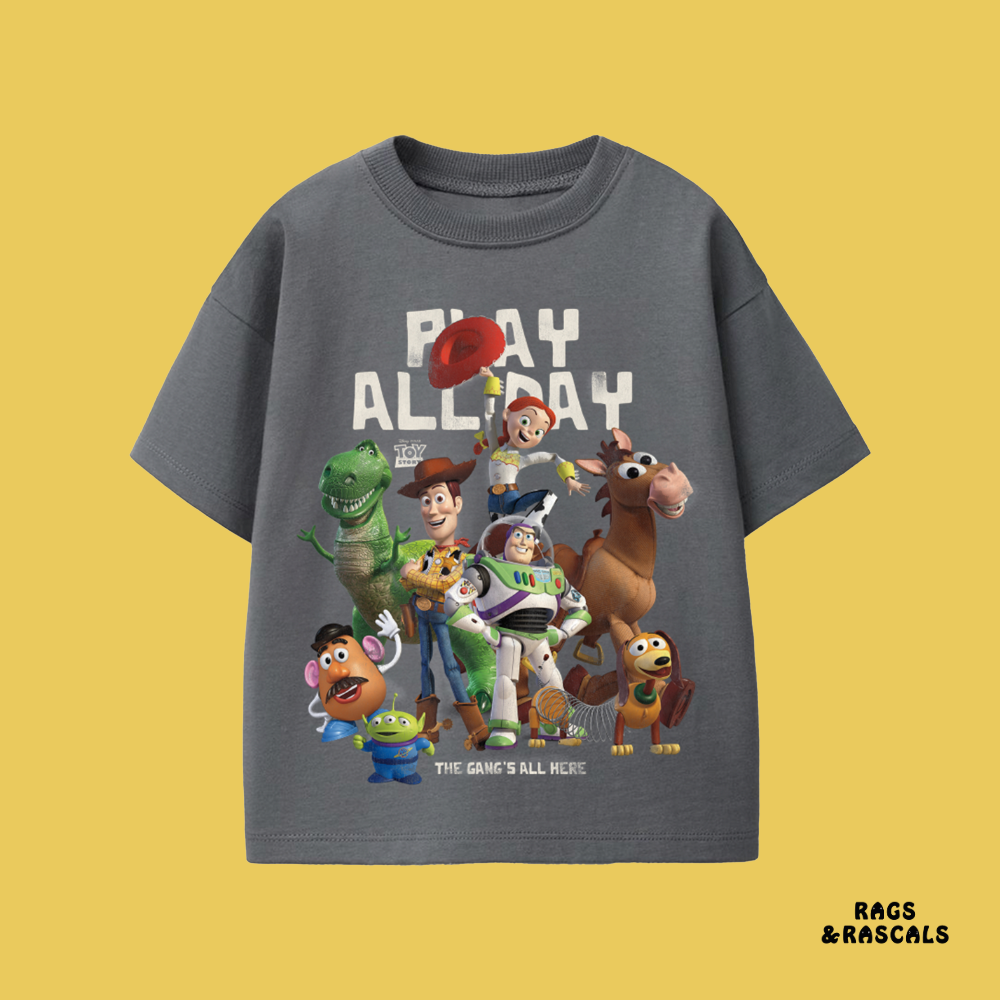 Gray t-shirt with Toy Story characters and 'Play All Day' text, from a children's brand called 'Rags & Rascals'.