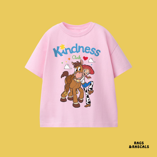 Pink Toy Story t-shirt with cartoon characters and 'Kindness Club' text, from a brand called "Rags and Rascals". 